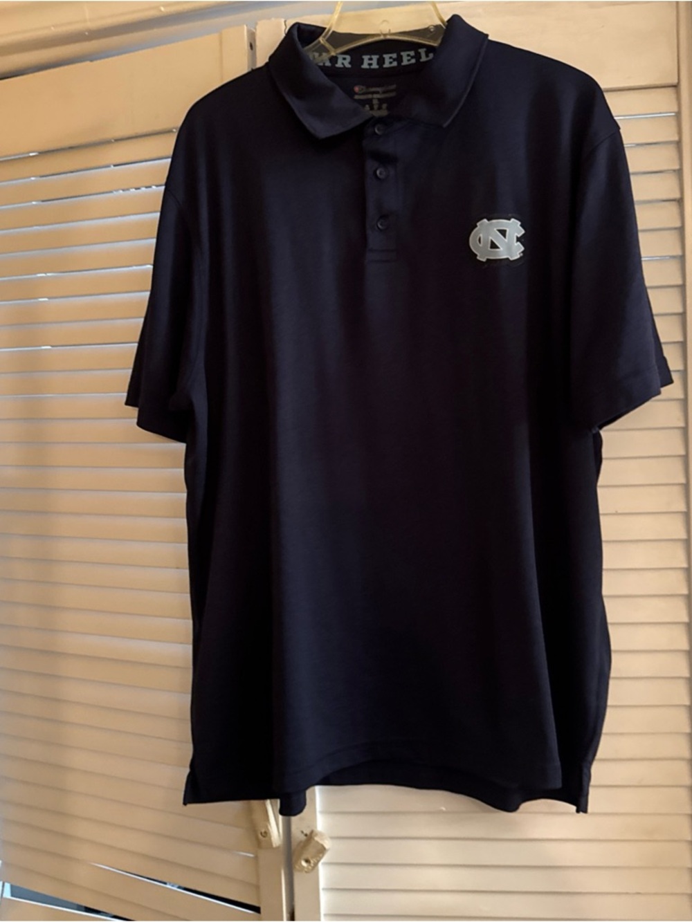 Champion Men's Navy Polo with Light Blue NC Logo